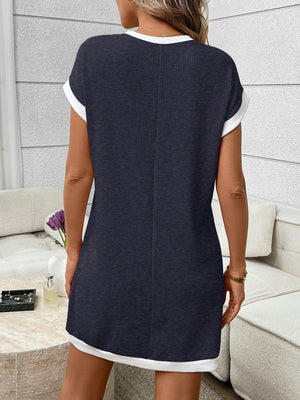 Navy ribbed knit mini dress with white trim, short sleeves, and crew neck.