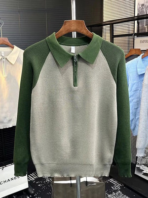 Men's green and grey raglan knit quarter zip sweater with a collared neckline.
