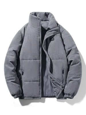 Men's grey corduroy puffer jacket with a high collar and zip pockets.