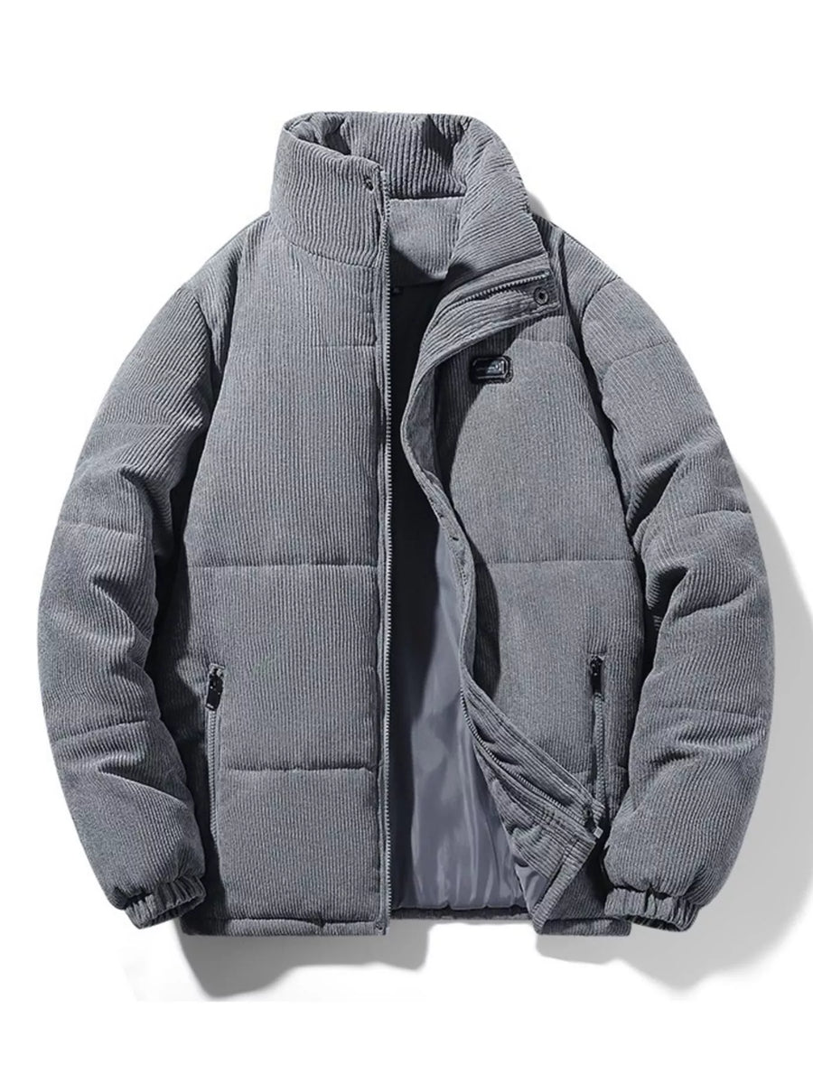 Men's grey corduroy puffer jacket with a high collar and zip pockets.