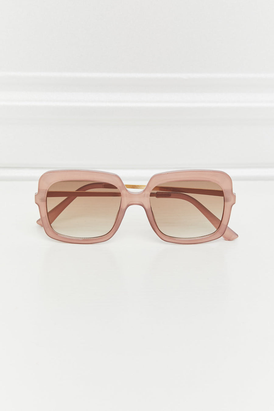 Sculpted square frame sunglasses in khaki with gradient brown lenses.