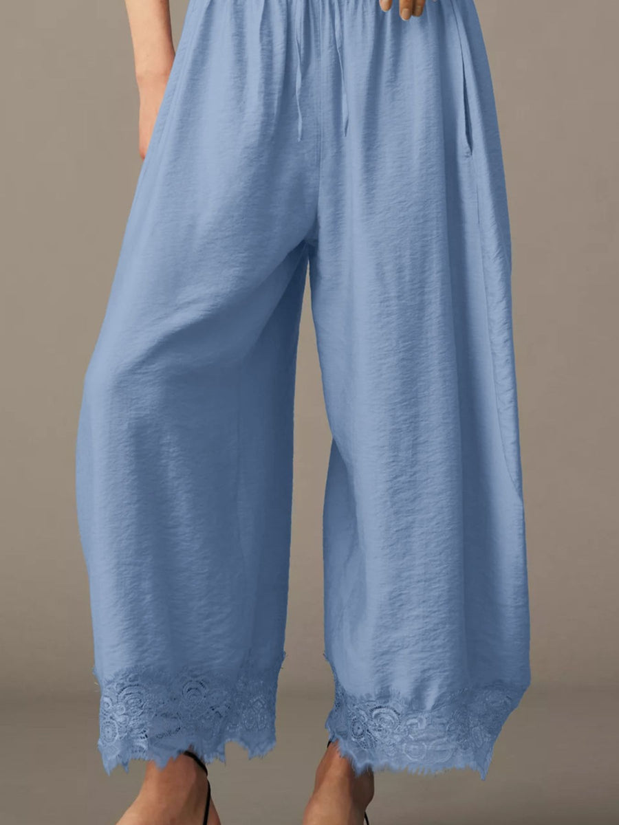 wide-leg pants in Black with drawstring and ankle-length