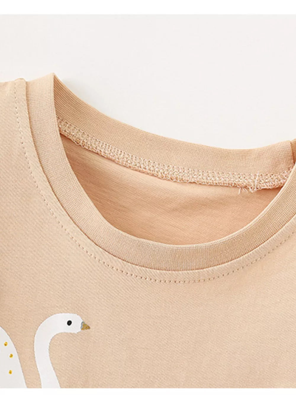 Girls' tan cotton undershirt with swan graphic and ruffle sleeves
