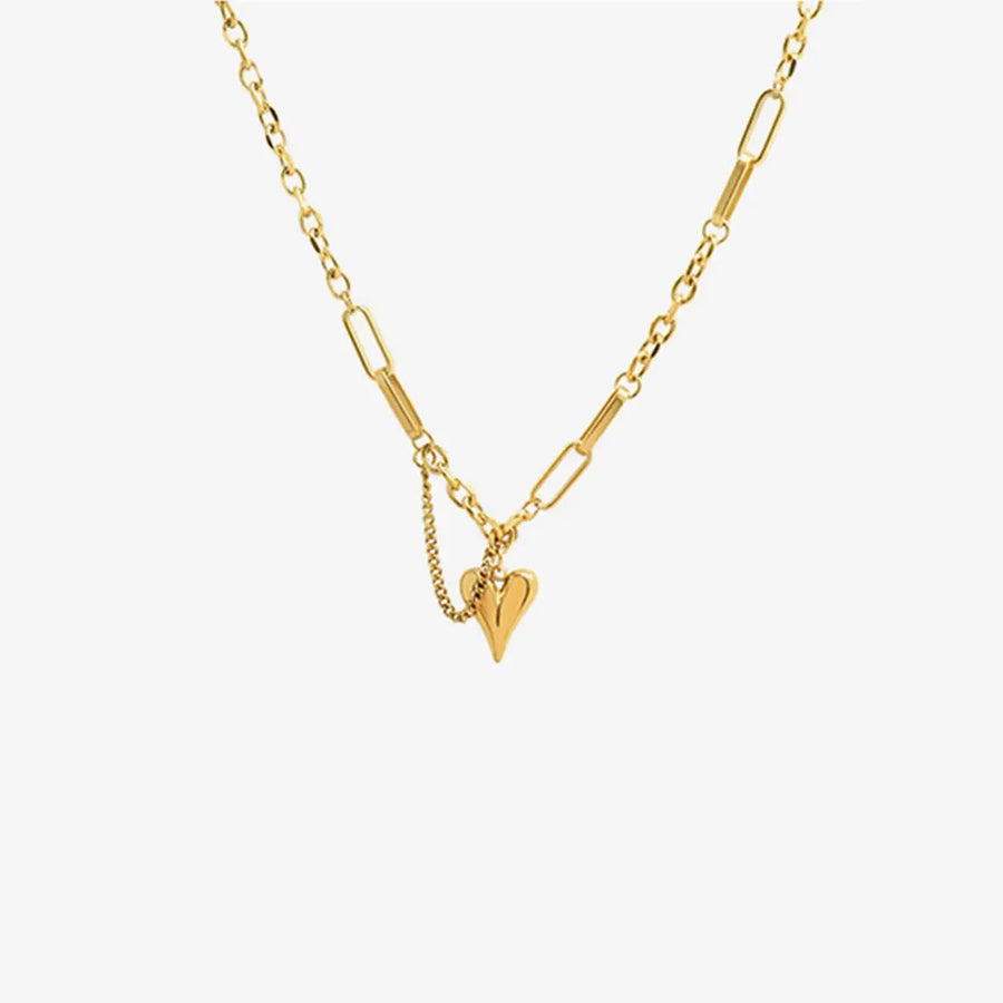 Gold heart drop chain link necklace with delicate charm detail