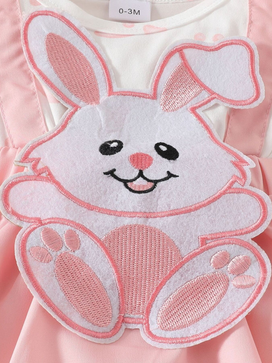 Baby dress with pink bunny applique and polka dot detail