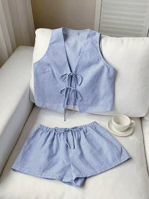 Blue striped tie-front vest and shorts set with drawstring waist and adjustable ties.