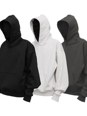 Oversized slouch hoodies in black, light gray, and dark gray with kangaroo pockets.