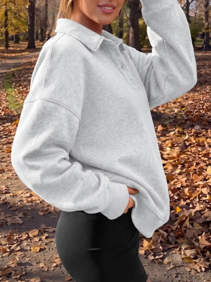 Black sweatshirt with hip-length and half-button