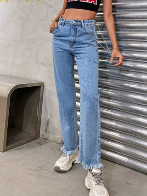 Light wash denim jeans with frayed hem and chain detail