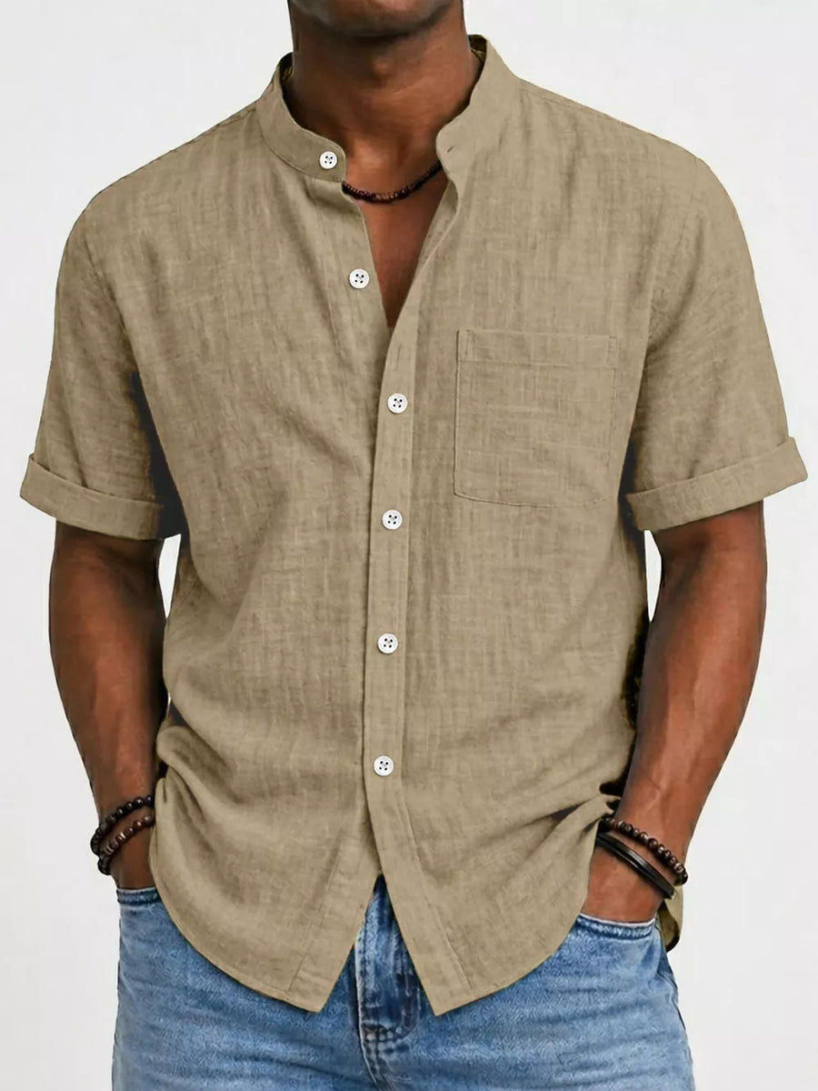 Textured band collar short sleeve button-up shirt in Khaki cotton with chest pocket.