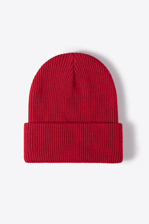 Red ribbed knit beanie with a cuffed brim