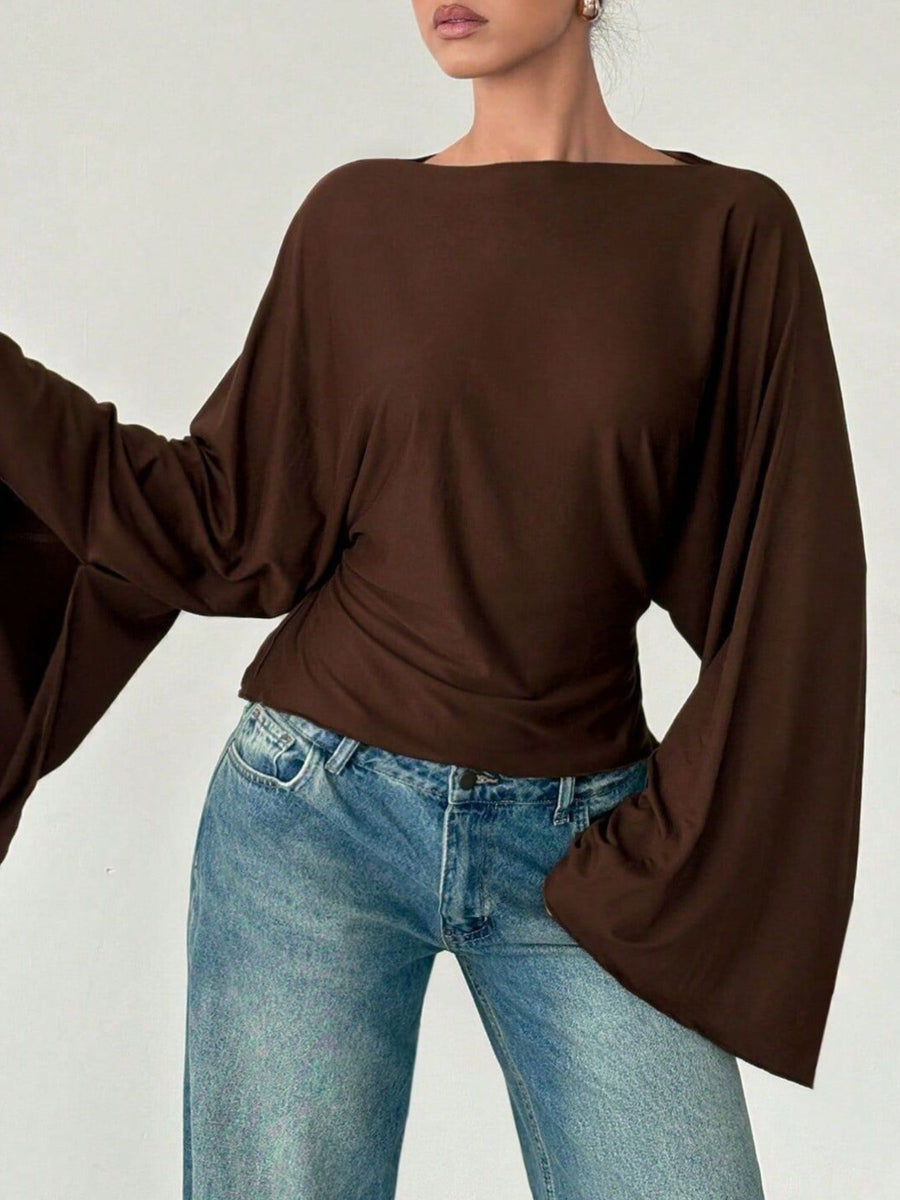 95% polyester, 5% elastane Care instructions: Machine wash cold top in Black with relaxed silhouette
