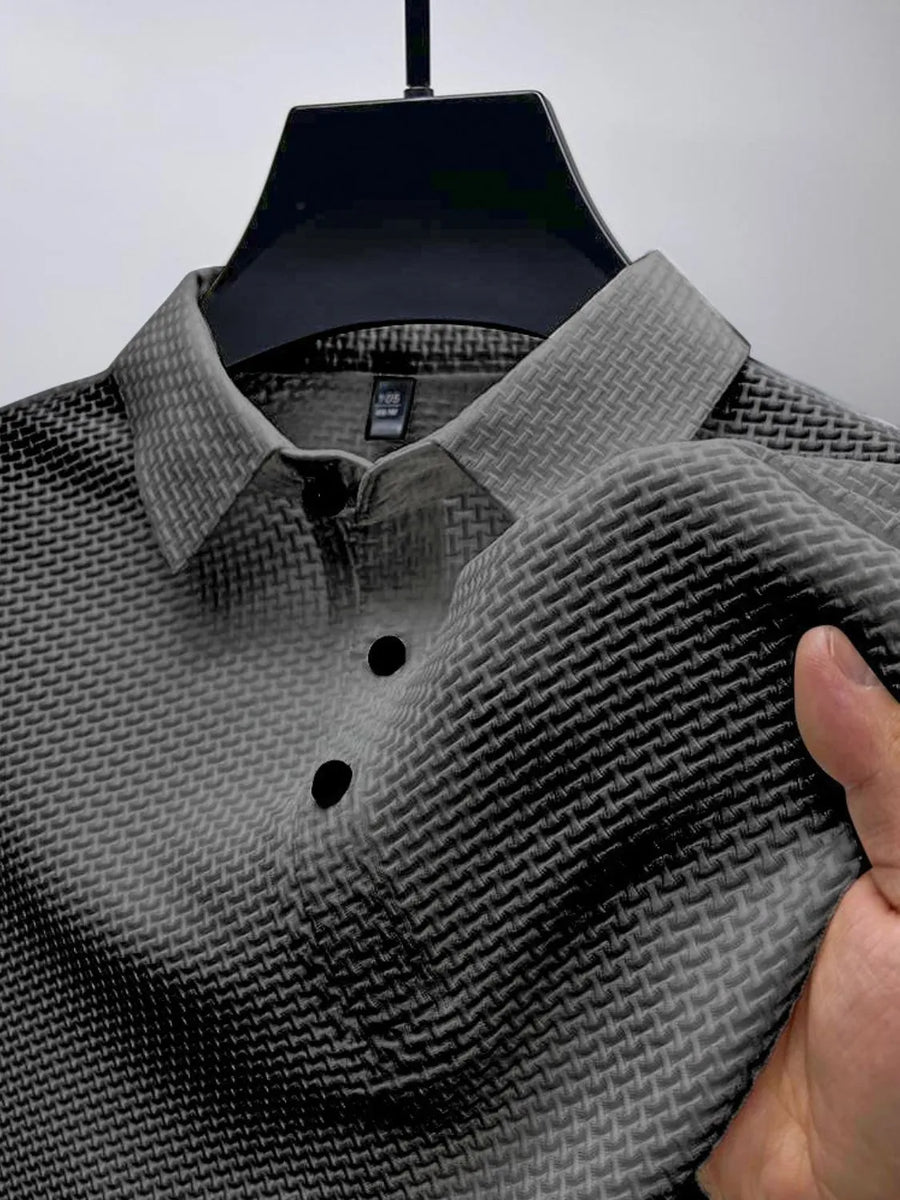 Textured weave polo shirt with maxi collar in dark gray, featuring a subtle basketweave pattern and black buttons.