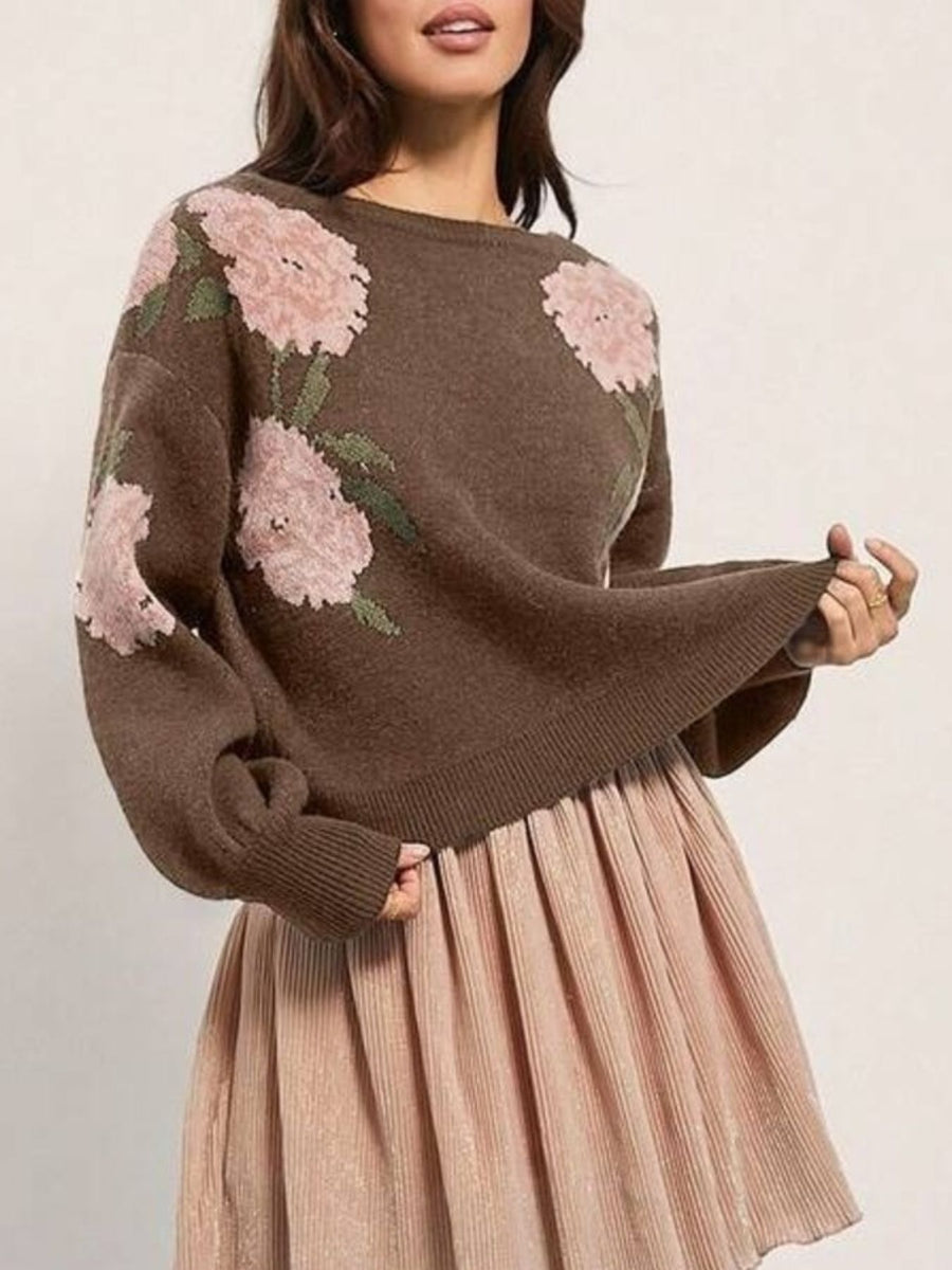 pullover sweater featuring floral in blush pink with 100% polyester Care instructions: Machine wash cold texture