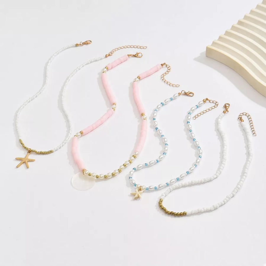 Synthetic Pearl,18K Gold-Plated,Alloy,Polymer clay, rice beads Care instructions necklace in gold with straight silhouette