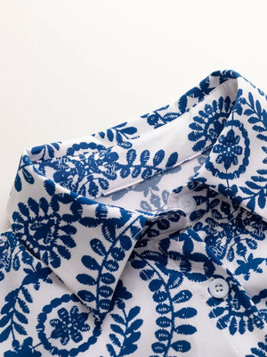 Blue printed romper with button detail and collar