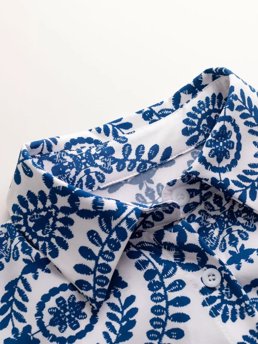 Blue printed romper with button detail and collar