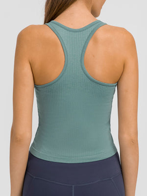 Turquoise ribbed racerback tank top with a fitted silhouette.