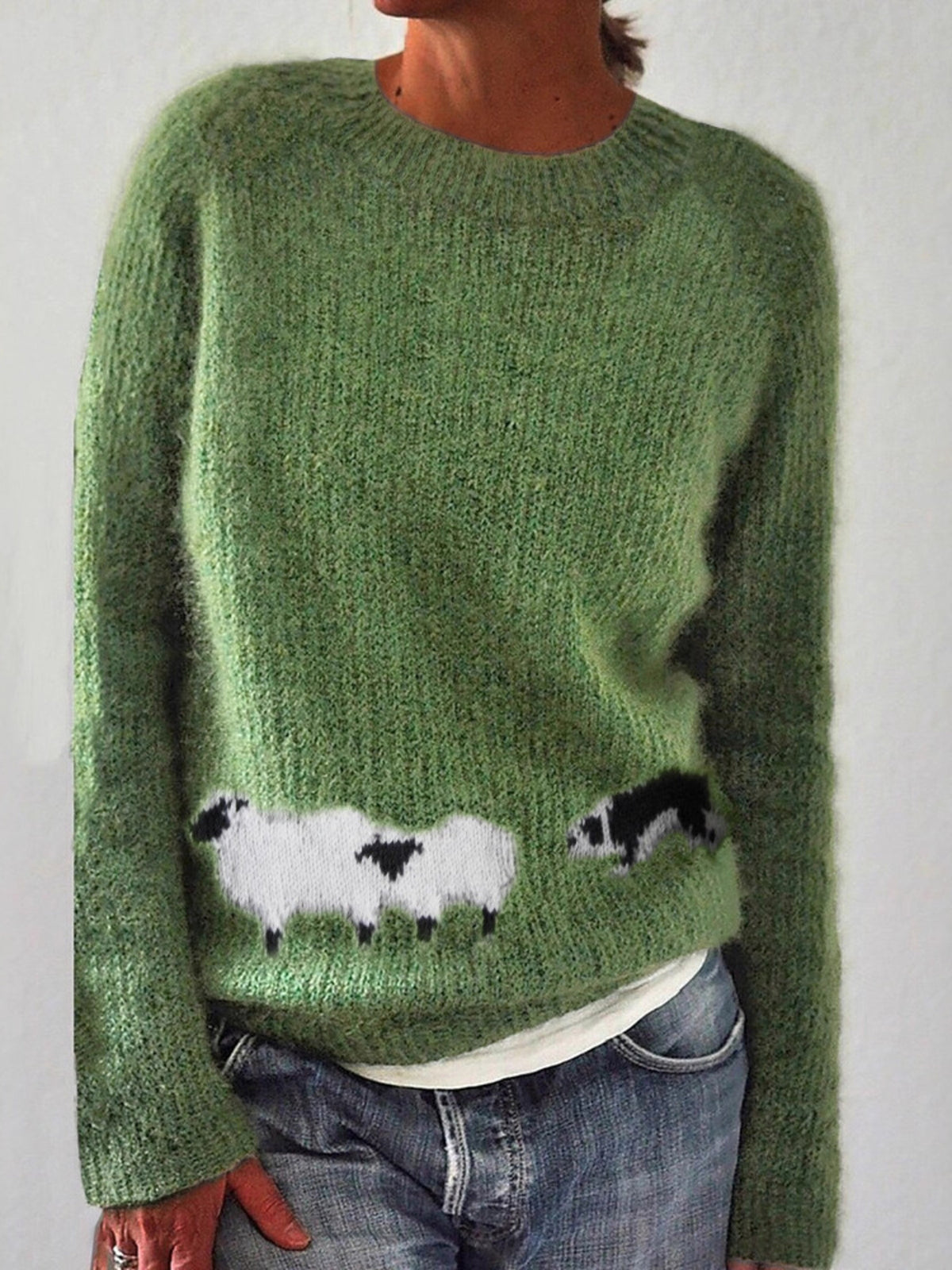 sage green pullover sweater with animal graphic and crew neck