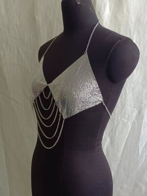 Polyester content is greater than 90% and up to 95% Care instructions: Hand wash halter top in gold with relaxed silhouette