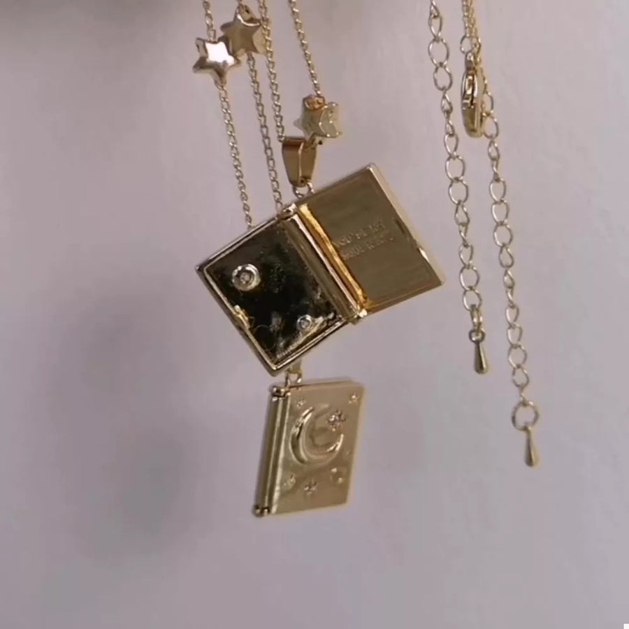necklace in ivory with celestial and layered