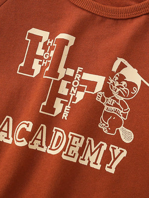 Rust cotton graphic sweatshirt with "HIGH FRONTIER ACADEMY" text and cartoon beaver.