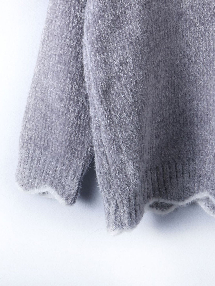 Gray acrylic knit sweater with scalloped trim detail on hem and cuffs.