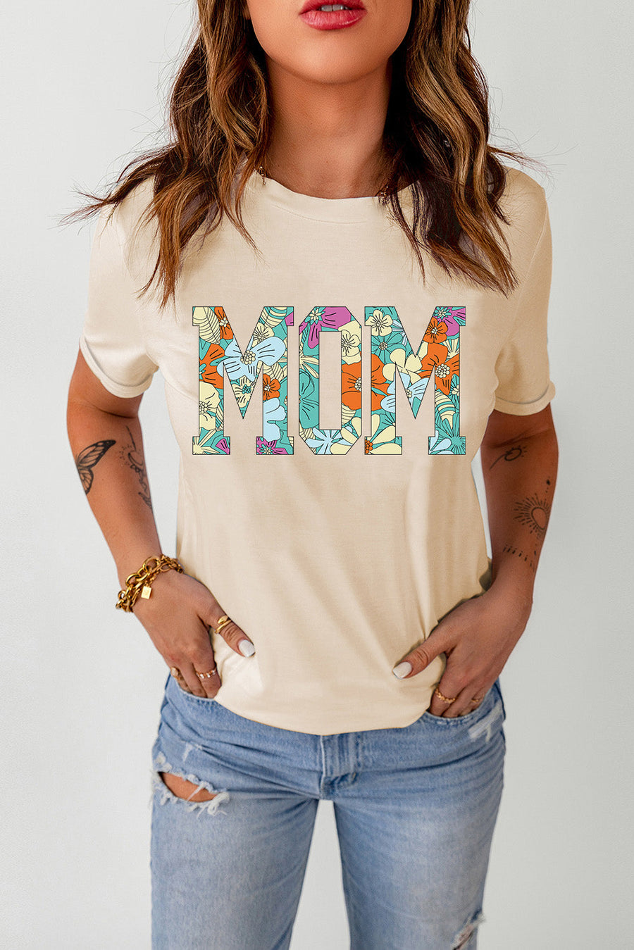 Light Apricot floral mom graphic tee with short sleeves and a crew neck.