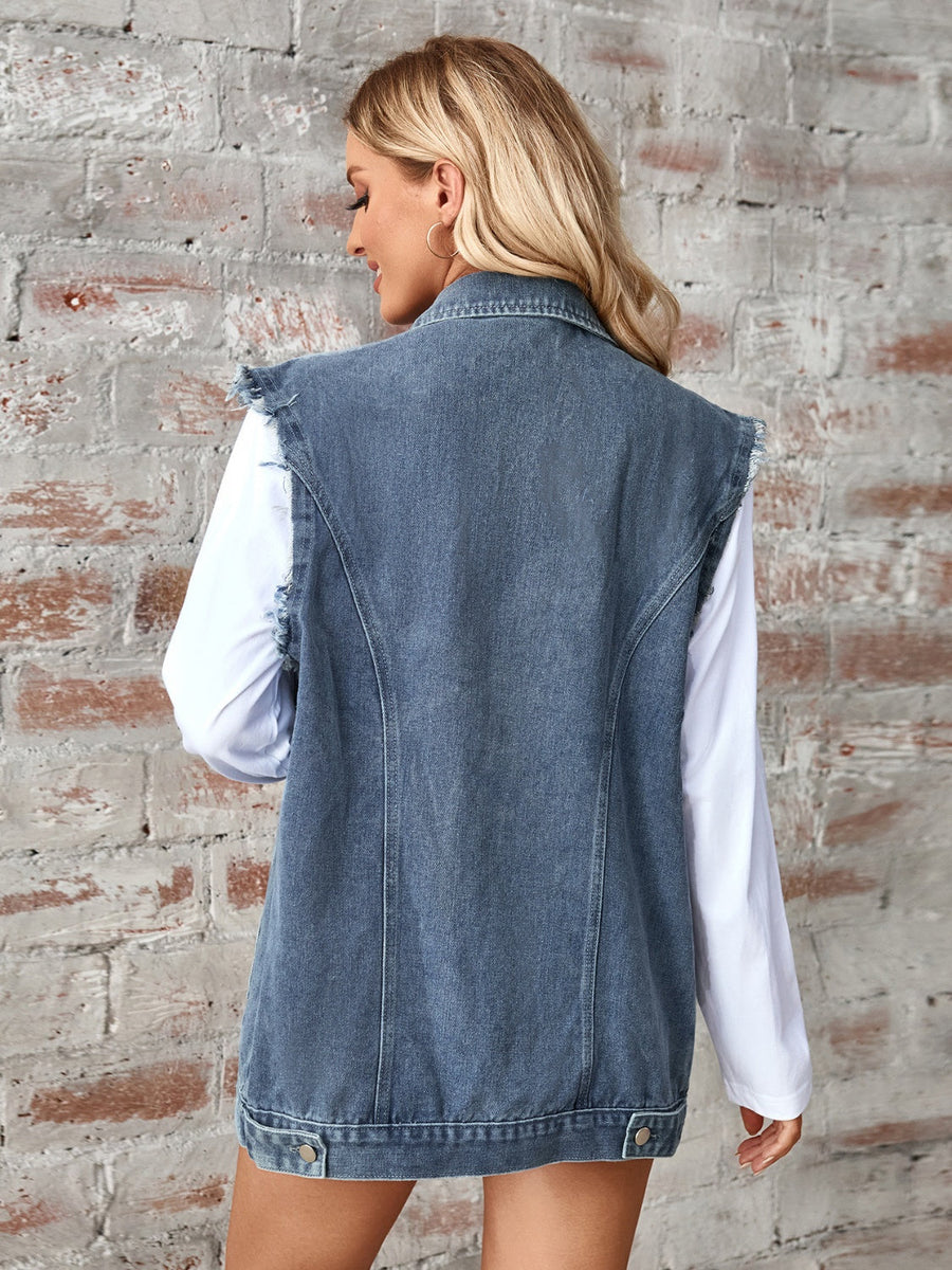 Dusty blue denim utility vest with raw frayed edges and button details.