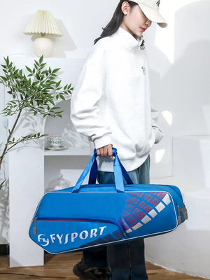 Blue nylon sports equipment bag with white trim and graphic detail