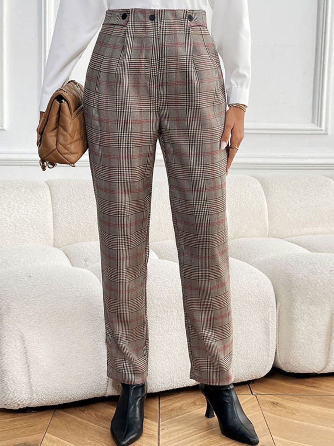 High-waisted taupe plaid trousers with pleat detail and button closure