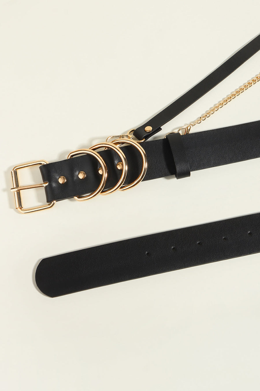 Black PU leather harness belt with gold chain detail and multiple rings.