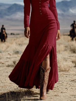 Long sleeve maxi dress in wine red with button detail and a high slit, styled with cowboy boots.