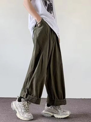 Relaxed fit green cargo pants with cuffed hems and a casual style.
