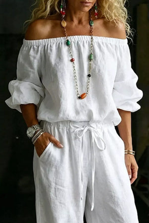 White off-shoulder two-piece set with drawstring waist and puff sleeves