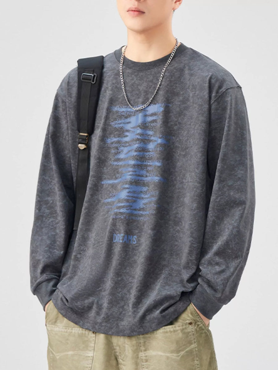 Dark Gray oversized long-sleeve tee with blue graphic print and "DREAMS" text.