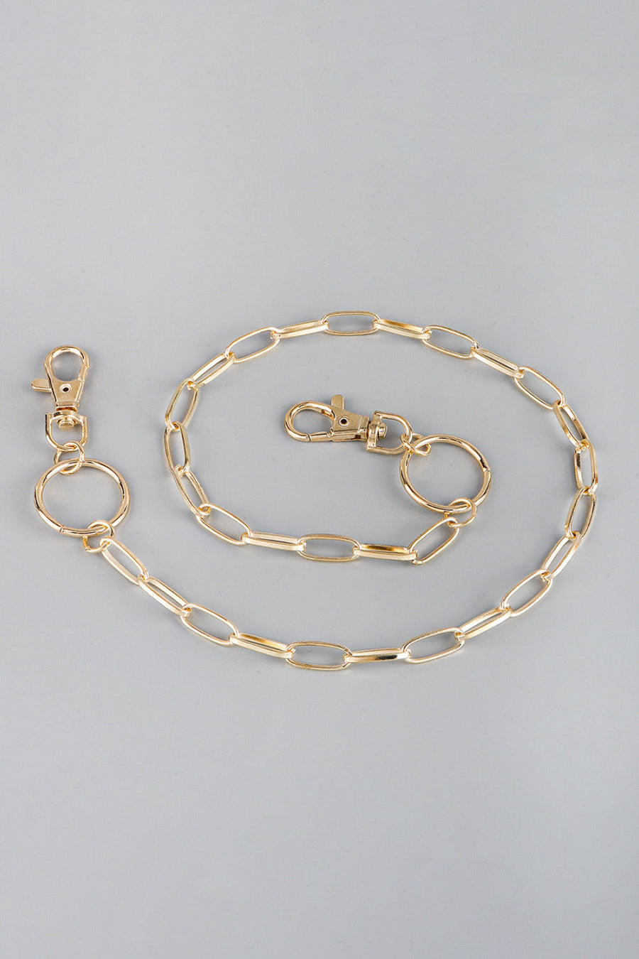 Gold chain wallet chain with two lobster clasps and a ring detail.