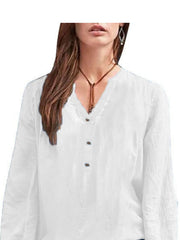 White long-sleeve blouse with notched neckline and button detail