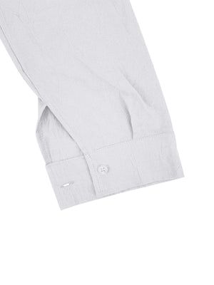 White cotton button-down shirt cuff detail