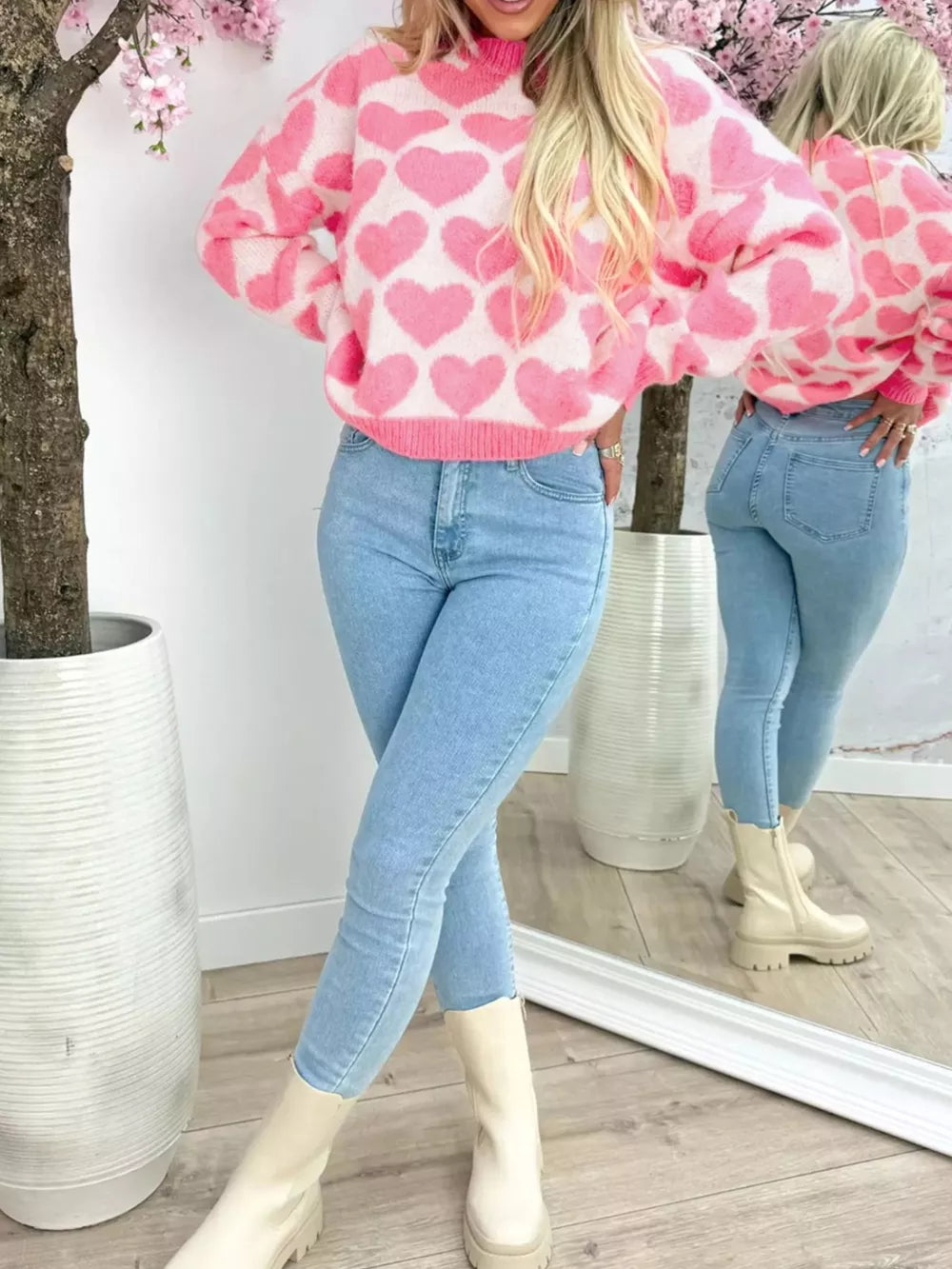 Charming heart pattern knit sweater in blush pink acrylic, crew neck, long sleeves.