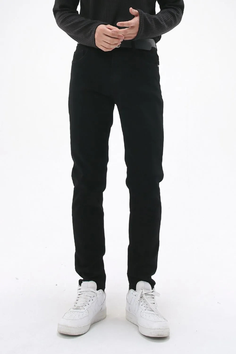 Black slim-fit stretch denim jeans with a casual cut.