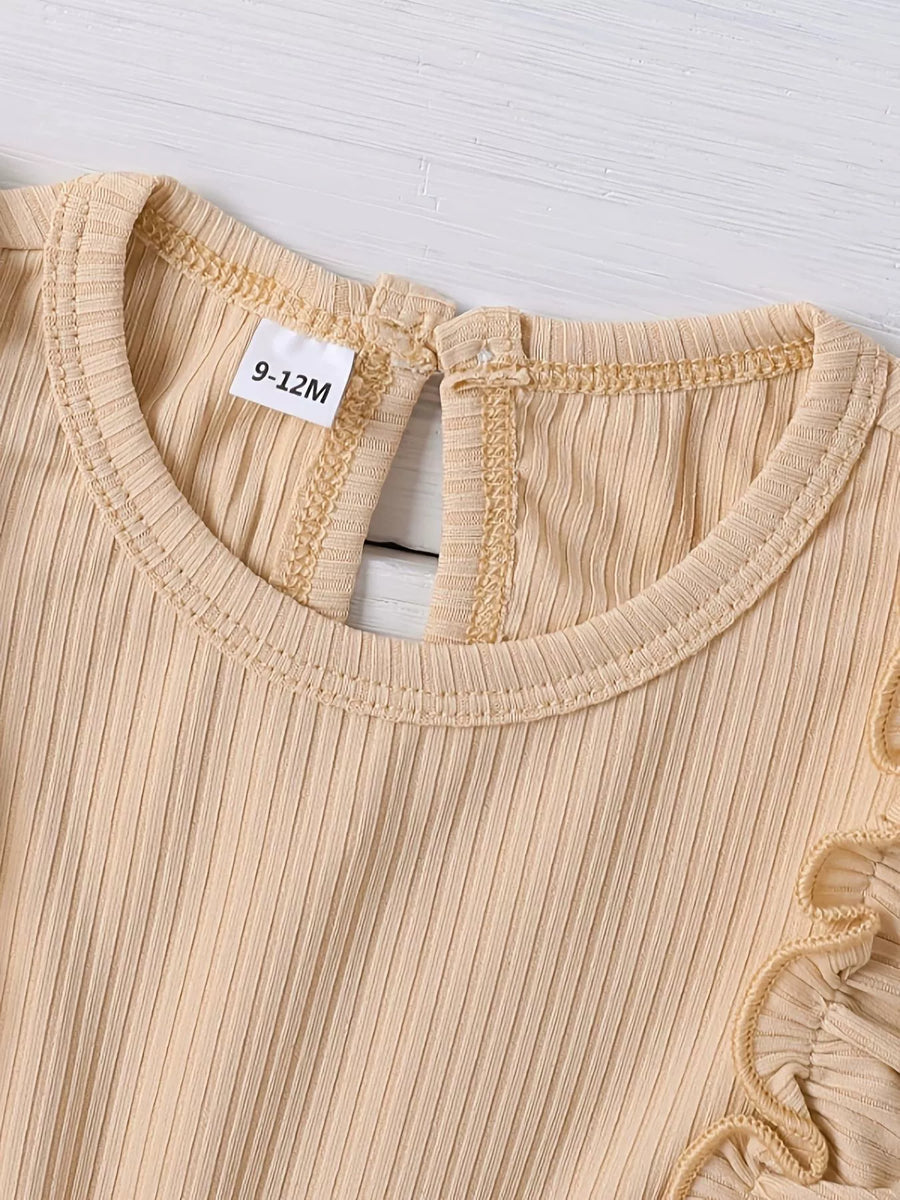 Baby girls' ribbed bodysuit in beige with ruffle detail and keyhole back.