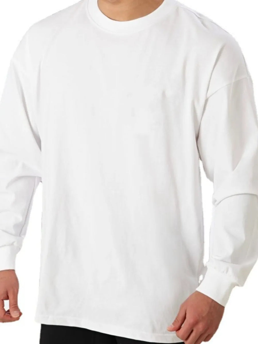 Oversized crewneck long sleeve t-shirt in white washed cotton with cuffed sleeves.