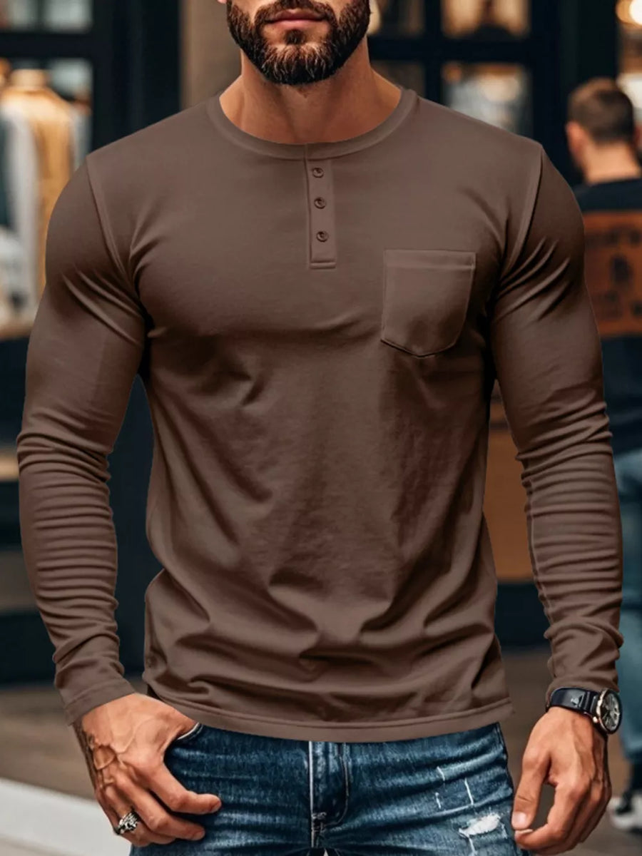 Brown long sleeve henley t-shirt with chest pocket and button placket.