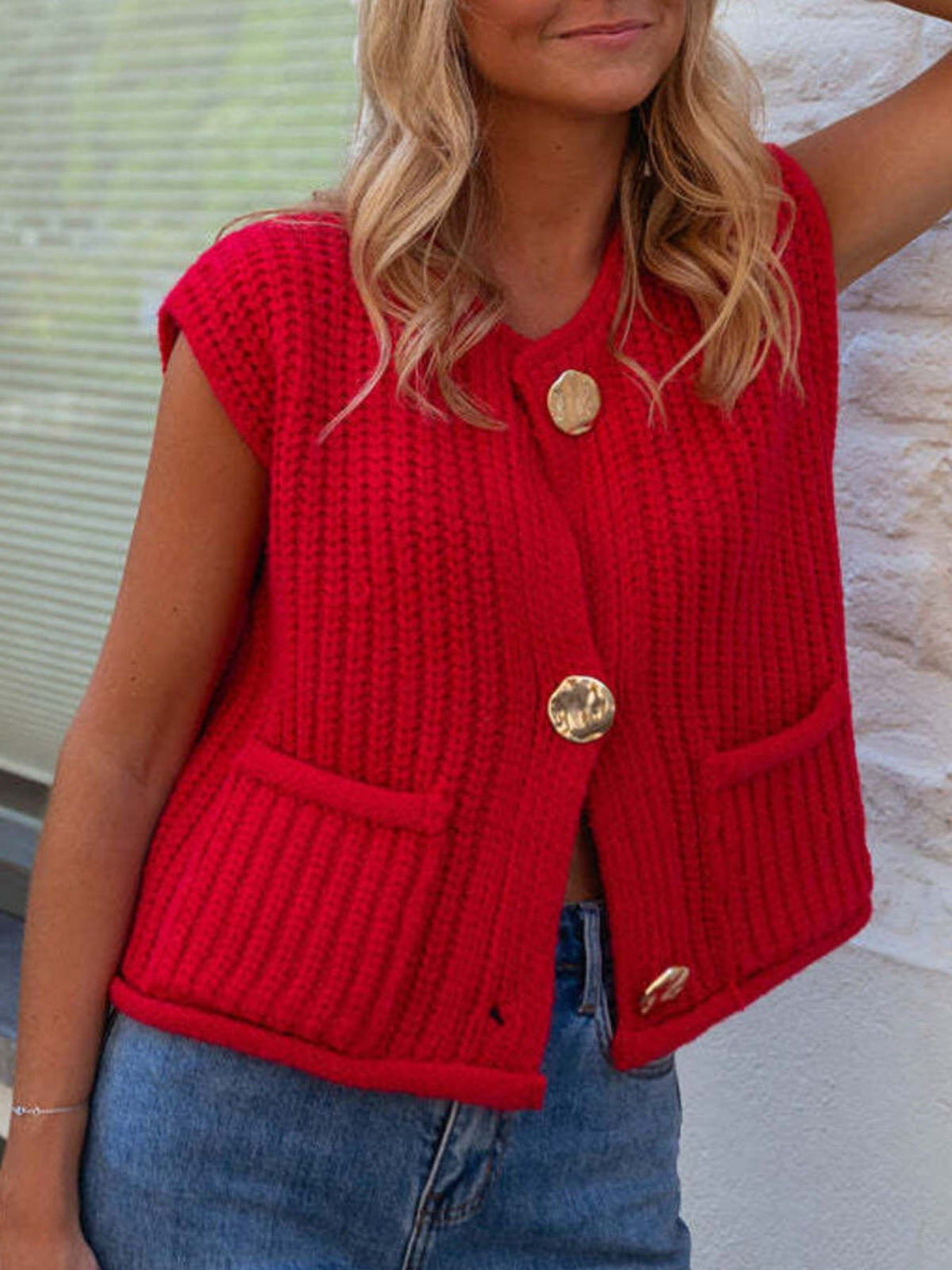 navy blue sweater vest with waist-length and button-front