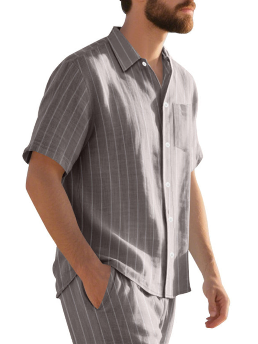 Grey striped cotton camp collar shirt with button-down front and chest pocket.