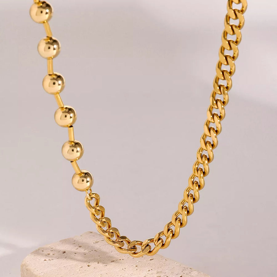 18K Gold-Plated,Stainless Steel Care instructions: Avoid wearing during exercise necklace in gold with linear silhouette