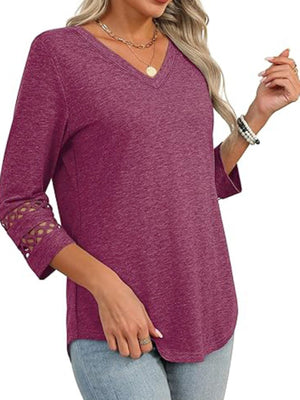 Burgundy V-neck t-shirt with 3/4 sleeves featuring cutout detail at the cuffs.