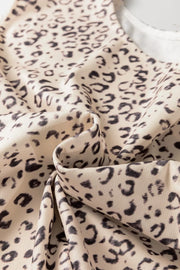 Knot detail leopard print tank top in cream and black.
