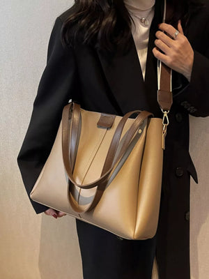 Elegant wide strap pu leather trapezoid bag in khaki with brown straps and detachable strap.